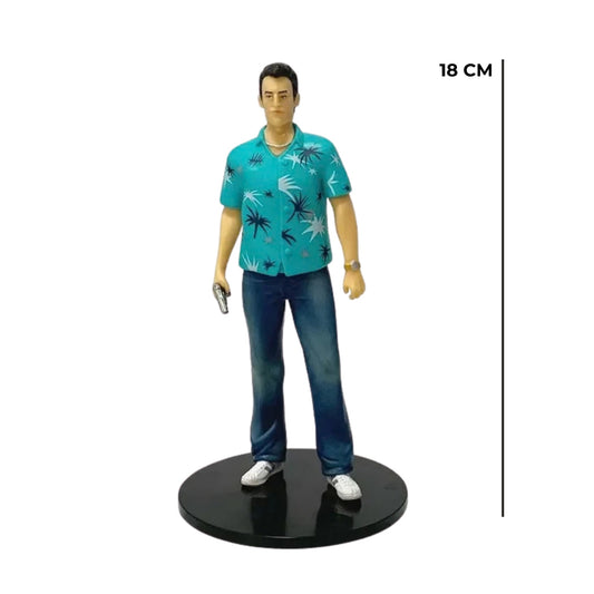 Side angle view of the Tommy Vercetti collectible figurine showing the teal Hawaiian shirt and pistol