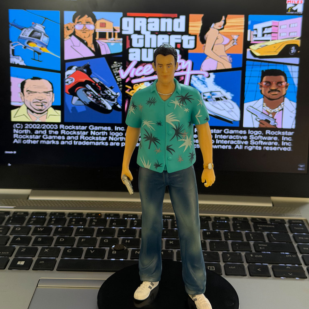 Tommy Vercetti Grand Theft Auto collectible figure set up for desktop gaming showcase and PC setups